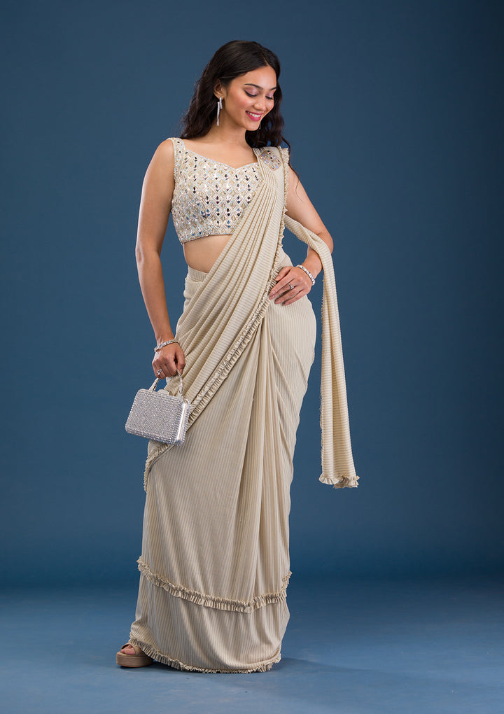 Koskii Beige Georgette Saree with Mirrorwork – Elegant Evening Wear
