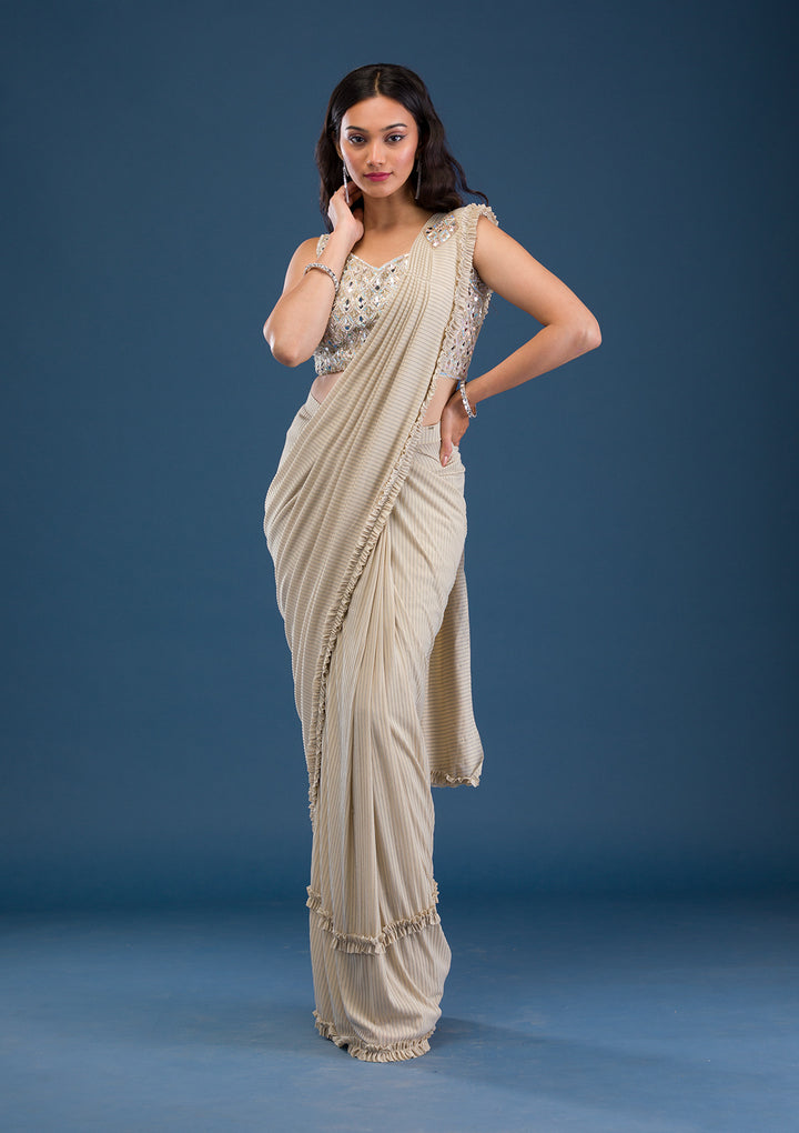 Koskii Beige Georgette Saree with Mirrorwork – Elegant Evening Wear