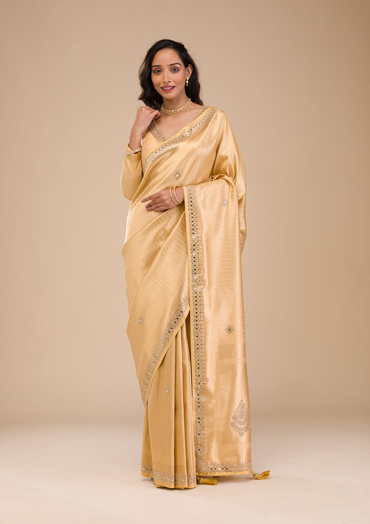 Koskii Orange Saree with Exquisite Threadwork – Traditional Elegance