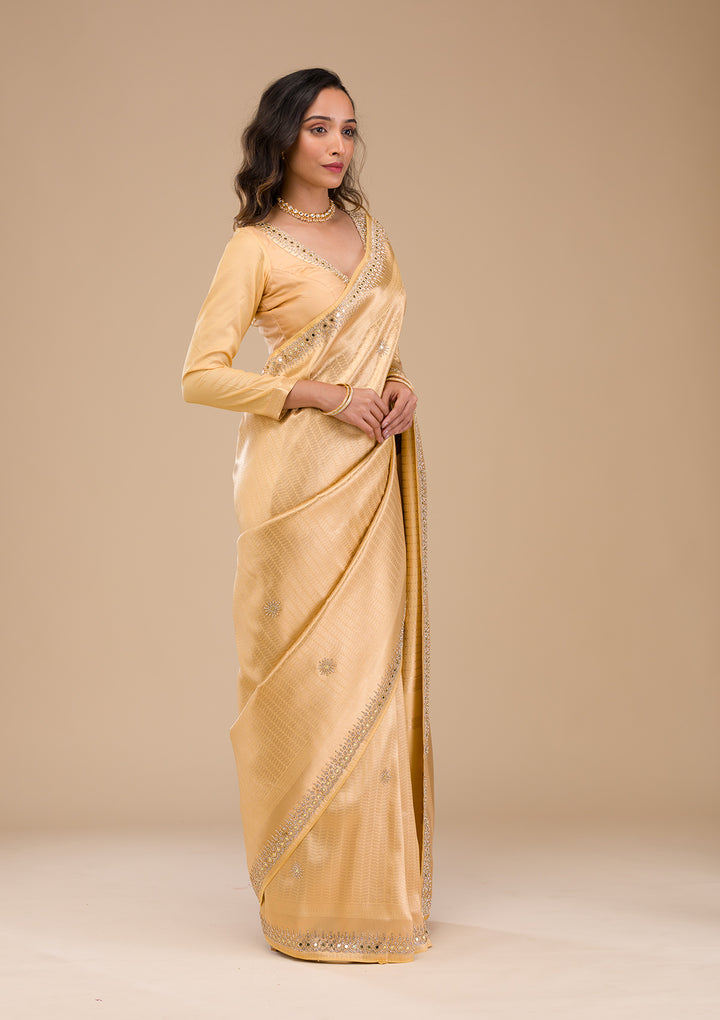 Koskii Orange Saree with Exquisite Threadwork – Traditional Elegance