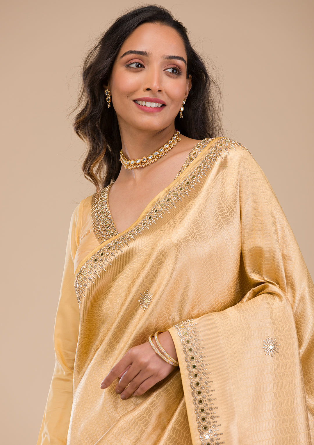 Koskii Orange Saree with Exquisite Threadwork – Traditional Elegance