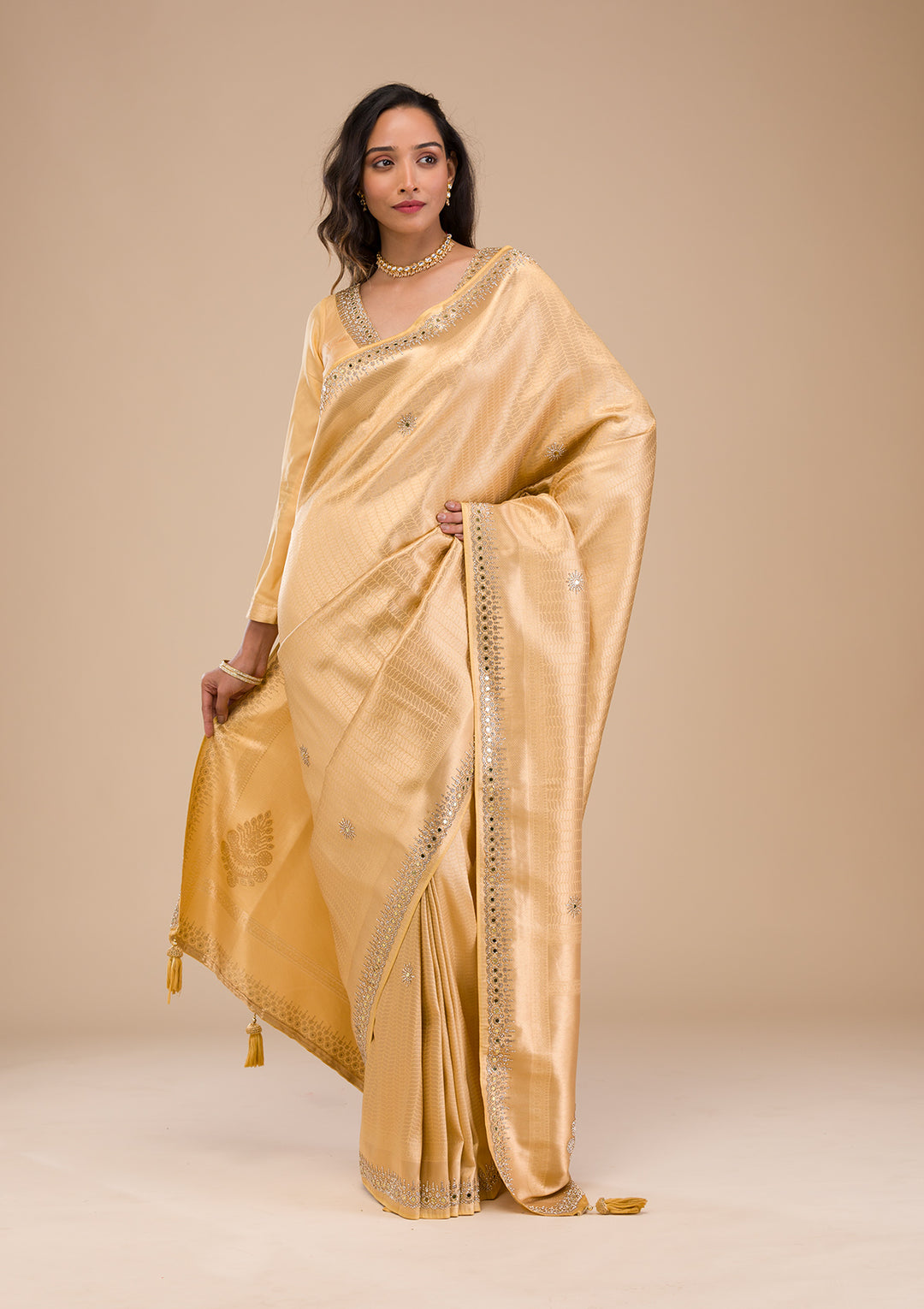 Koskii Orange Saree with Exquisite Threadwork – Traditional Elegance