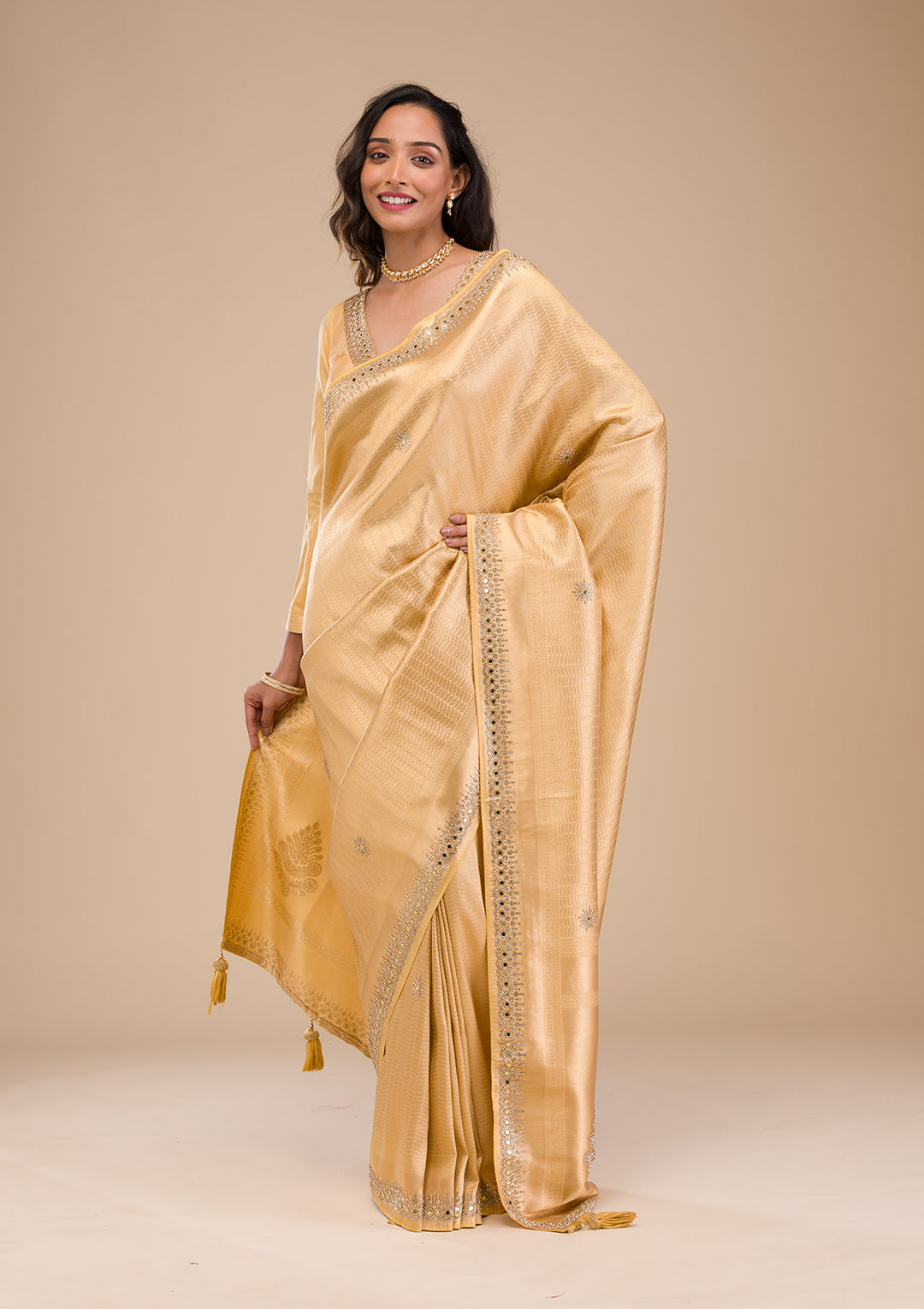 Koskii Orange Saree with Exquisite Threadwork – Traditional Elegance
