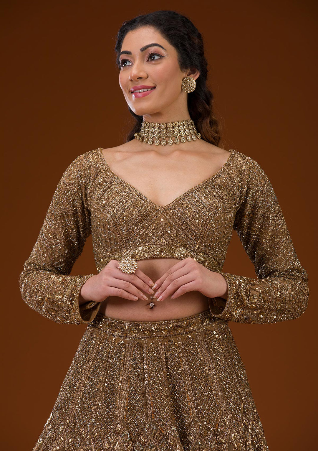 Koskii Net Gold Lehenga – Embellished with Exquisite Stonework
