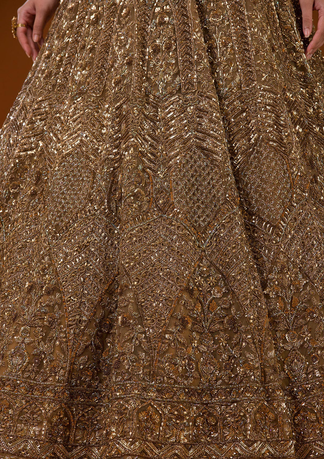Koskii Net Gold Lehenga – Embellished with Exquisite Stonework