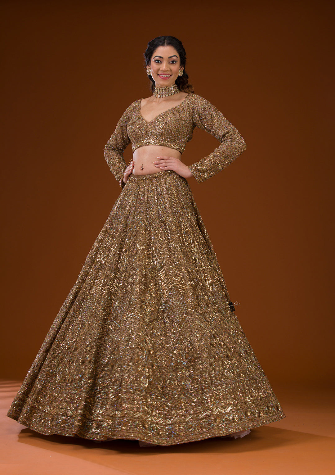 Koskii Net Gold Lehenga – Embellished with Exquisite Stonework
