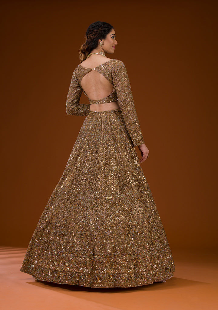 Koskii Net Gold Lehenga – Embellished with Exquisite Stonework