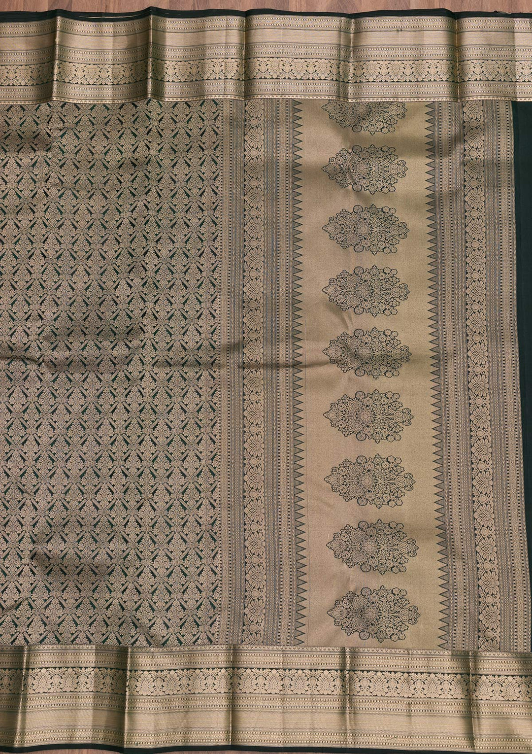 Bottle Green Silk Jaal Gold Zariwork Saree With Matching Blouse Piece