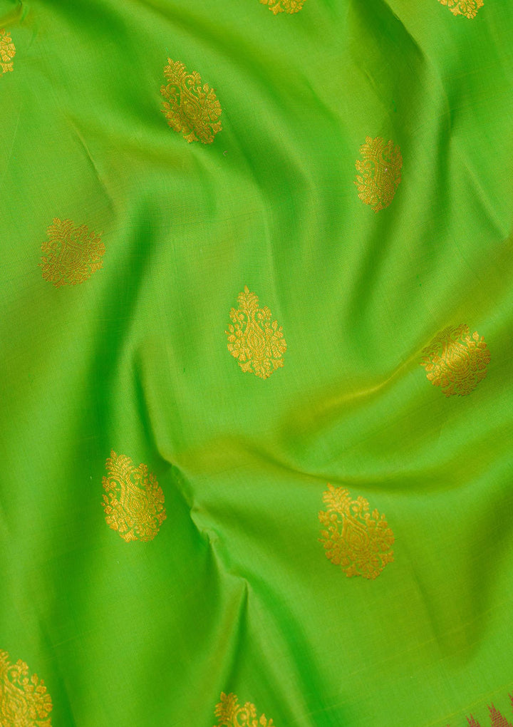 Green Silk Buti Saree With Matching Blouse Piece