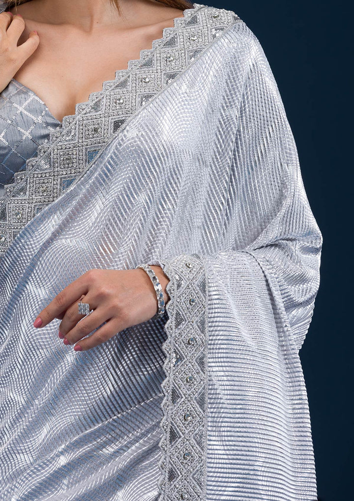 Light Grey Net Sequins Saree With Matching Blouse Piece
