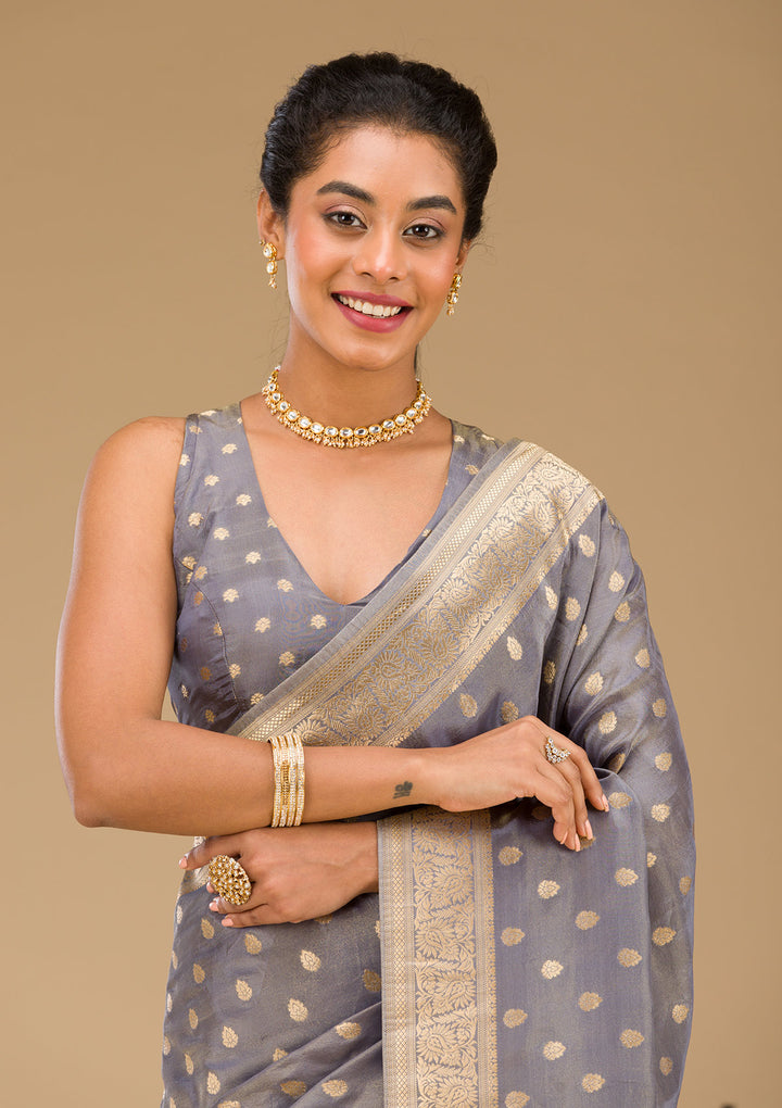 Koskii Orange Saree with Exquisite Threadwork – Traditional Elegance
