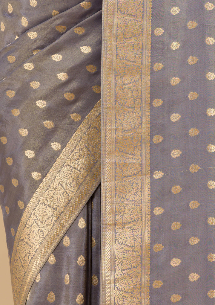 Koskii Orange Saree with Exquisite Threadwork – Traditional Elegance