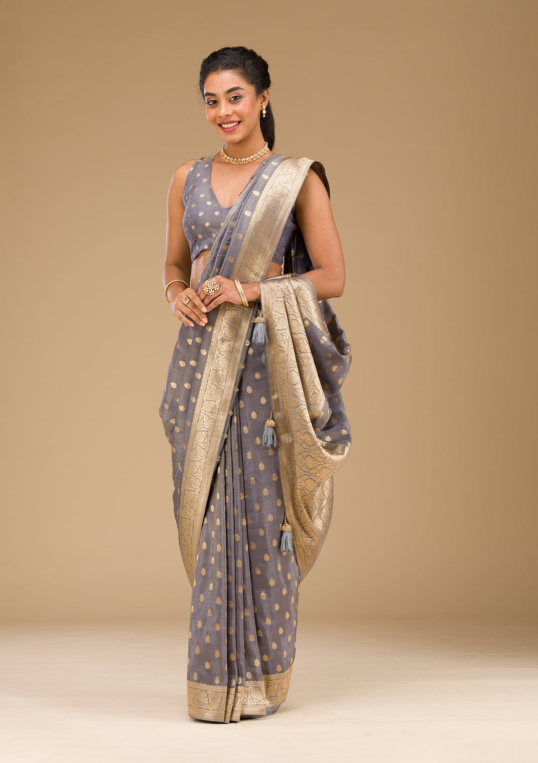 Koskii Orange Saree with Exquisite Threadwork – Traditional Elegance