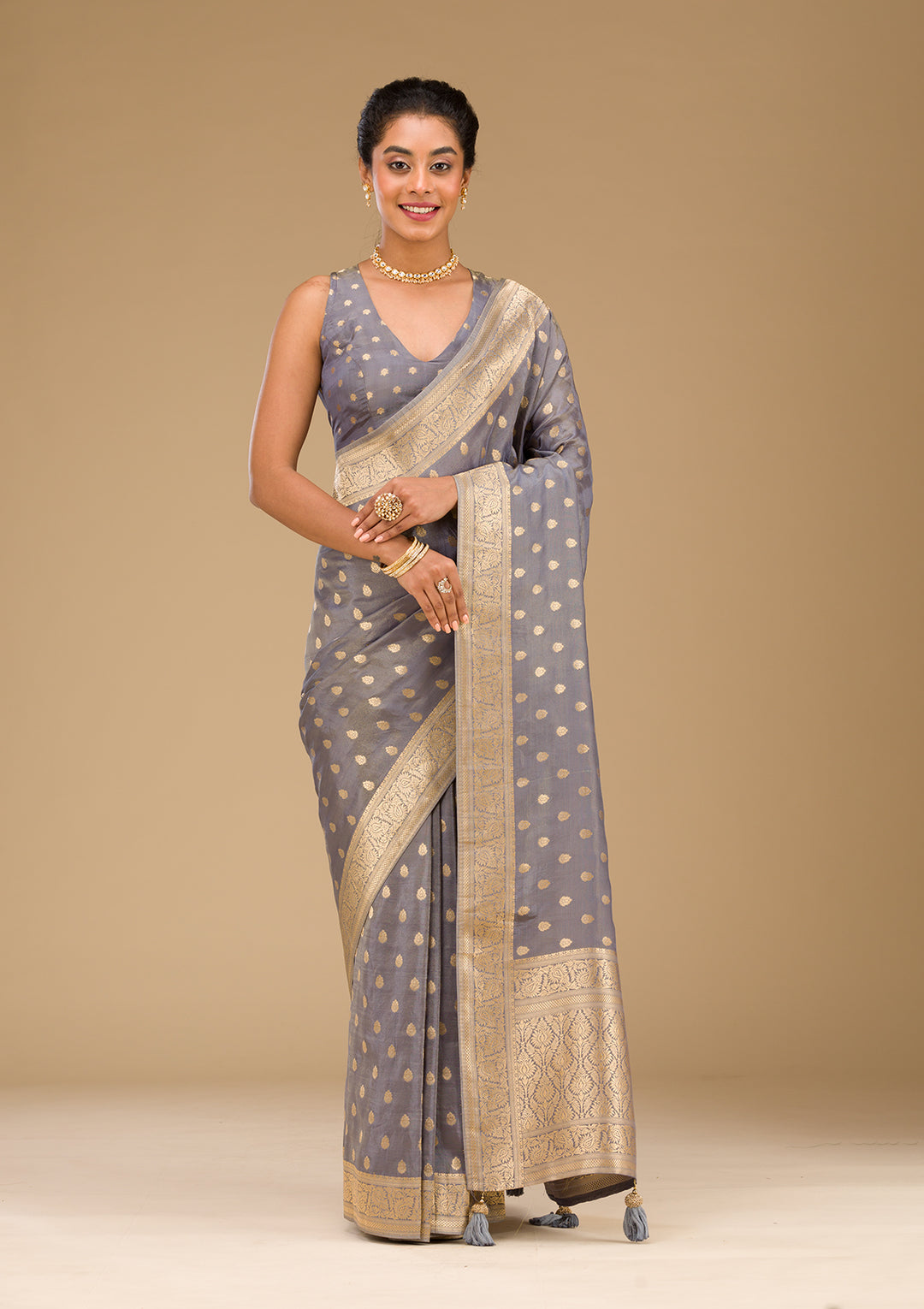 Koskii Orange Saree with Exquisite Threadwork – Traditional Elegance