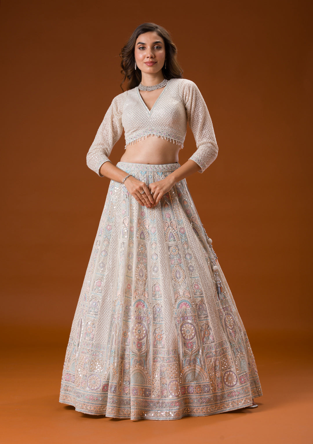 Koskii Net Ivory Lehenga – Elegance with Gotapatti Embroidery