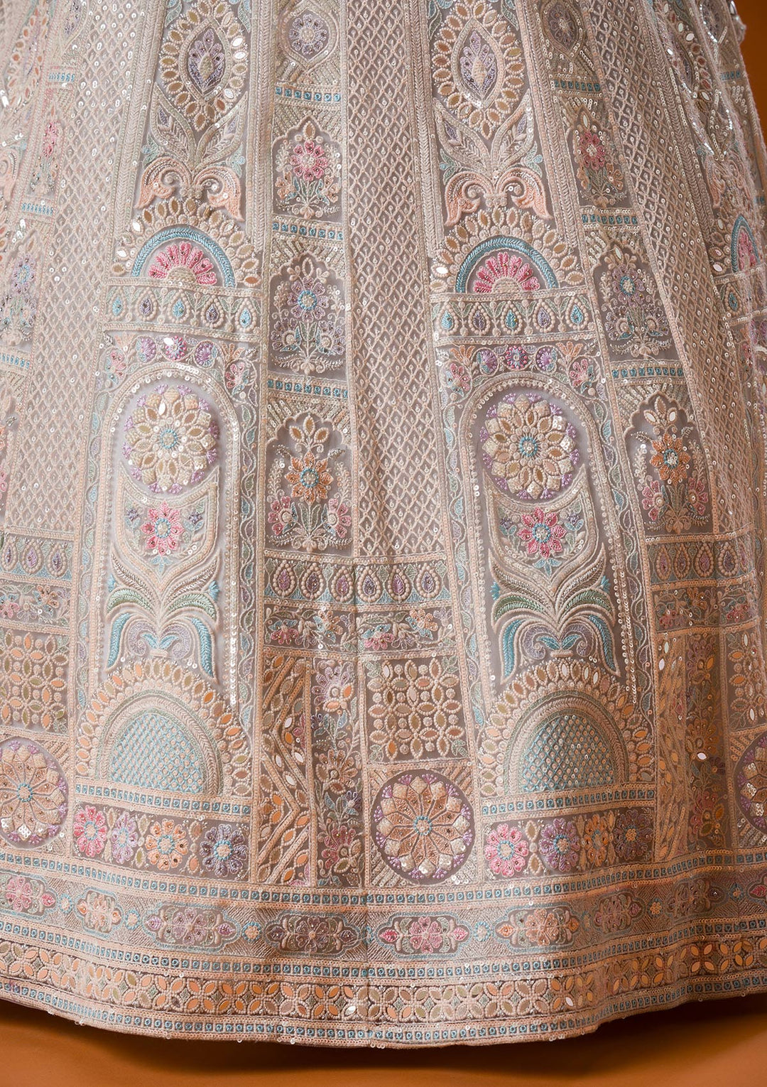 Koskii Net Ivory Lehenga – Elegance with Gotapatti Embroidery