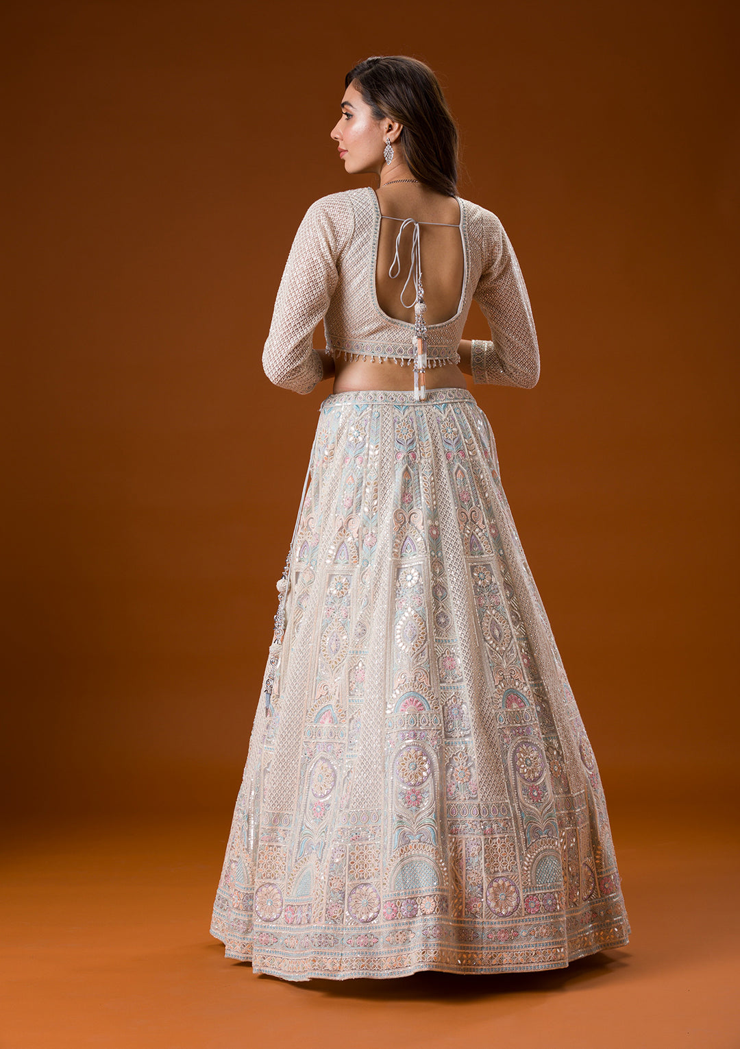 Koskii Net Ivory Lehenga – Elegance with Gotapatti Embroidery