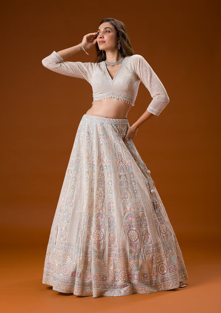 Koskii Net Ivory Lehenga – Elegance with Gotapatti Embroidery