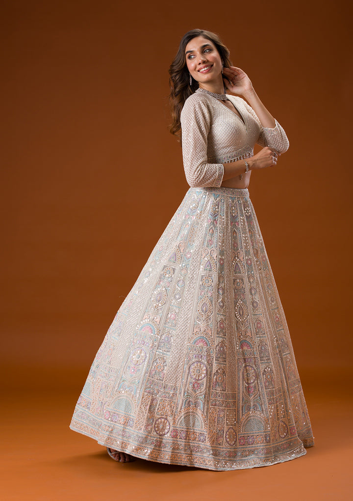 Koskii Net Ivory Lehenga – Elegance with Gotapatti Embroidery