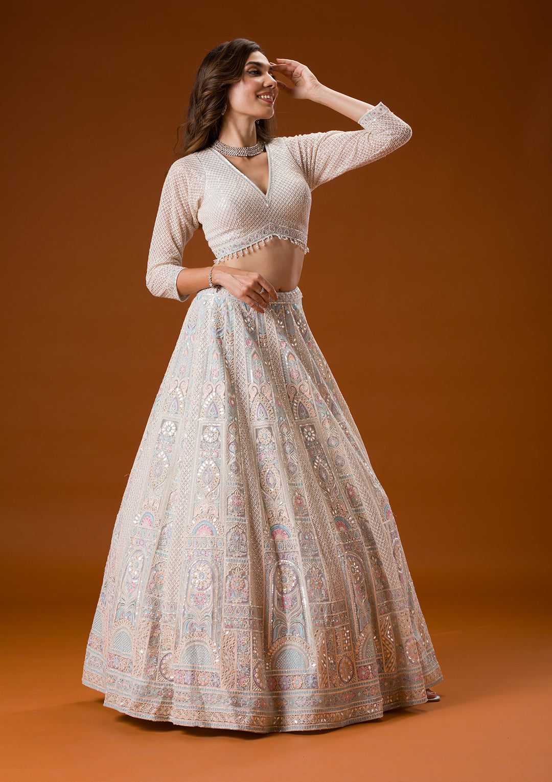 Koskii Net Ivory Lehenga – Elegance with Gotapatti Embroidery