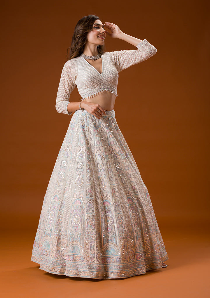 Koskii Net Ivory Lehenga – Elegance with Gotapatti Embroidery