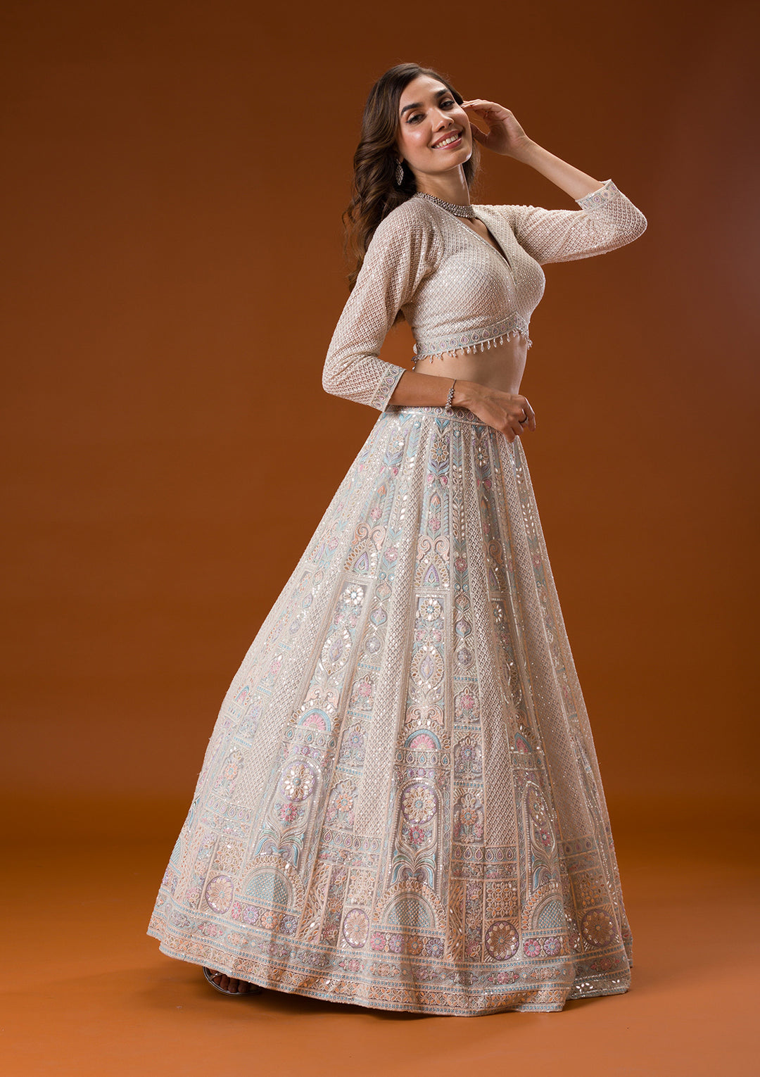 Koskii Net Ivory Lehenga – Elegance with Gotapatti Embroidery