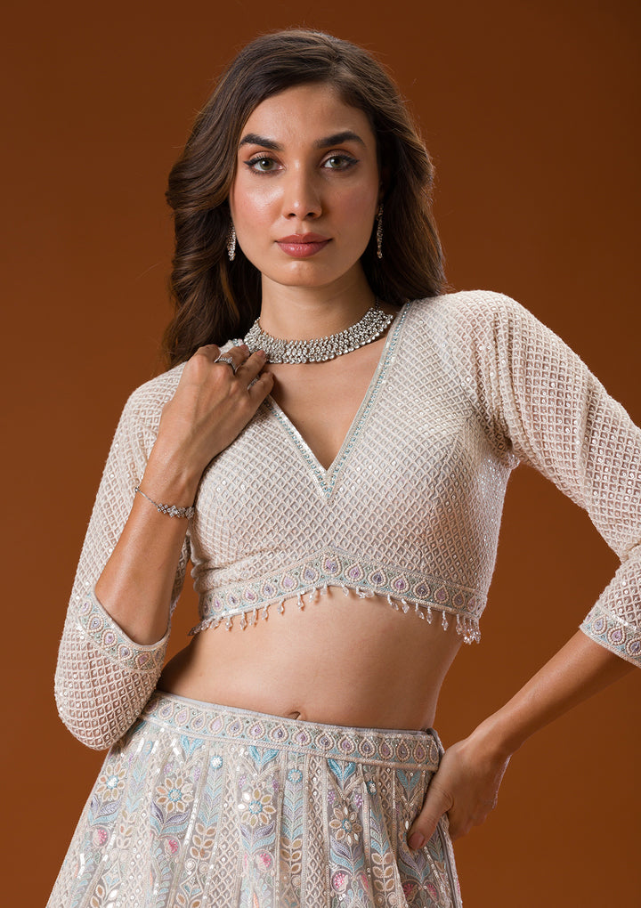 Koskii Net Ivory Lehenga – Elegance with Gotapatti Embroidery