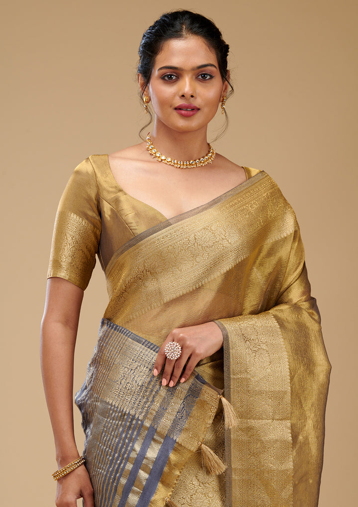 Koskii Gold Tissue Saree with Zariwork – Elegant Evening Wear