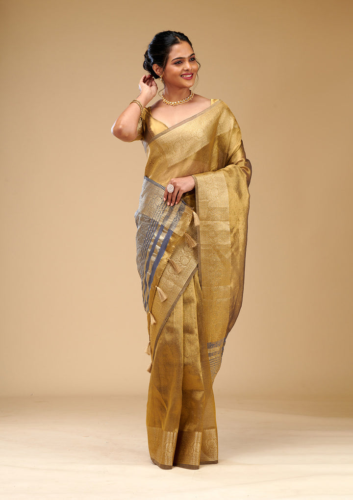Koskii Gold Tissue Saree with Zariwork – Elegant Evening Wear