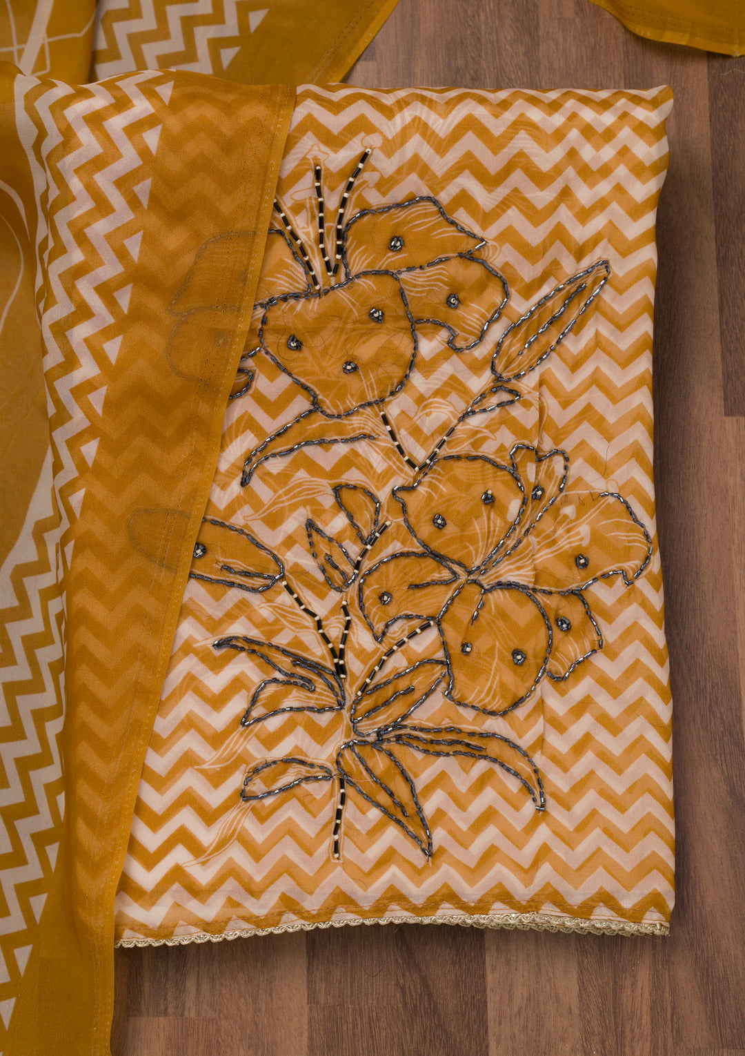 Mustard Printed Semi Crepe Unstitched Salwar Suit