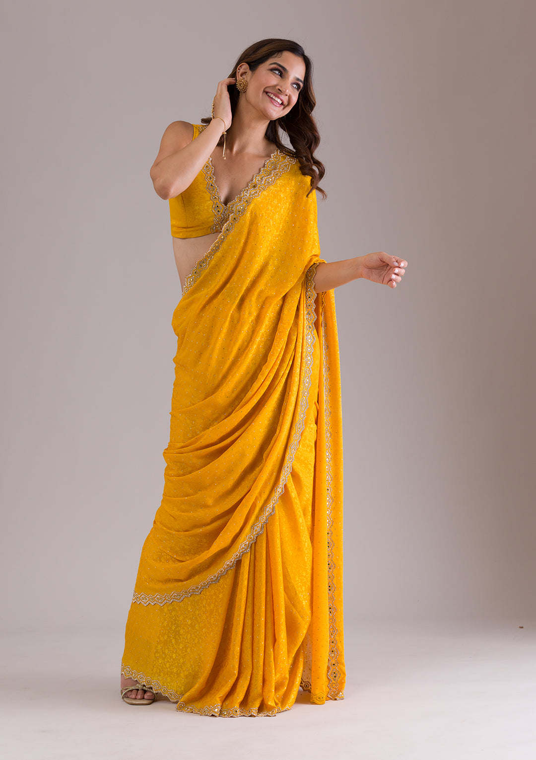 Mustard Stonework Semi Crepe Saree