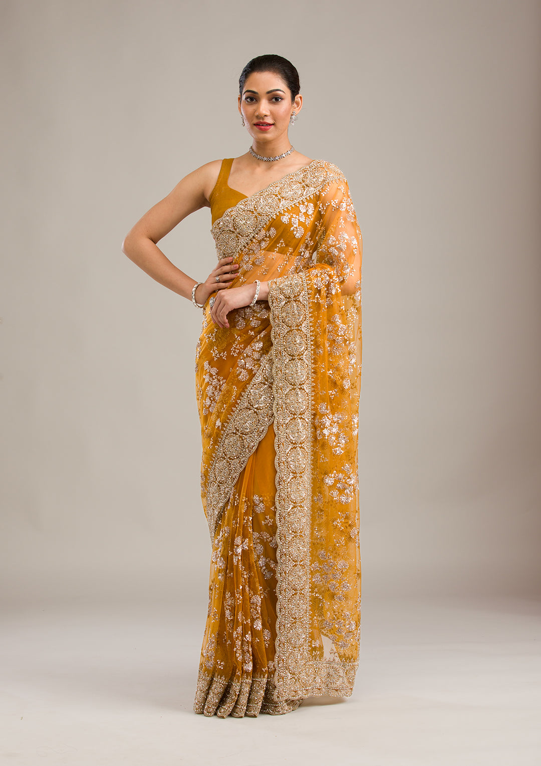 Koskii Net Golden Saree – Embellished with Zariwork