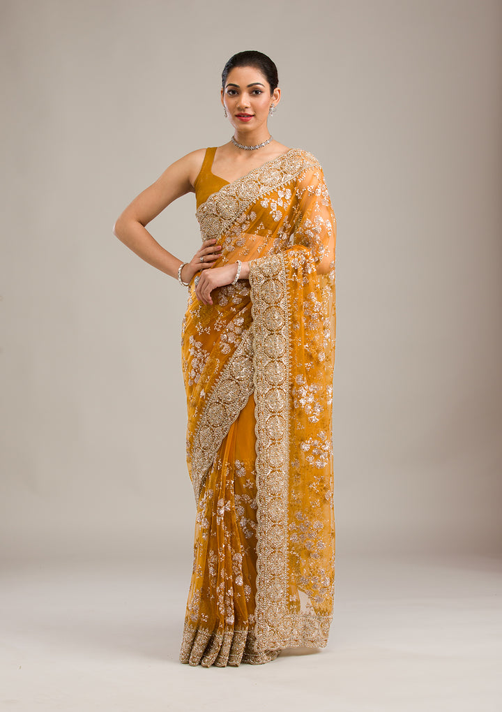 Koskii Net Golden Saree – Embellished with Zariwork