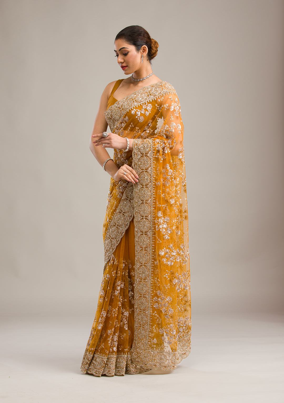 Koskii Net Golden Saree – Embellished with Zariwork