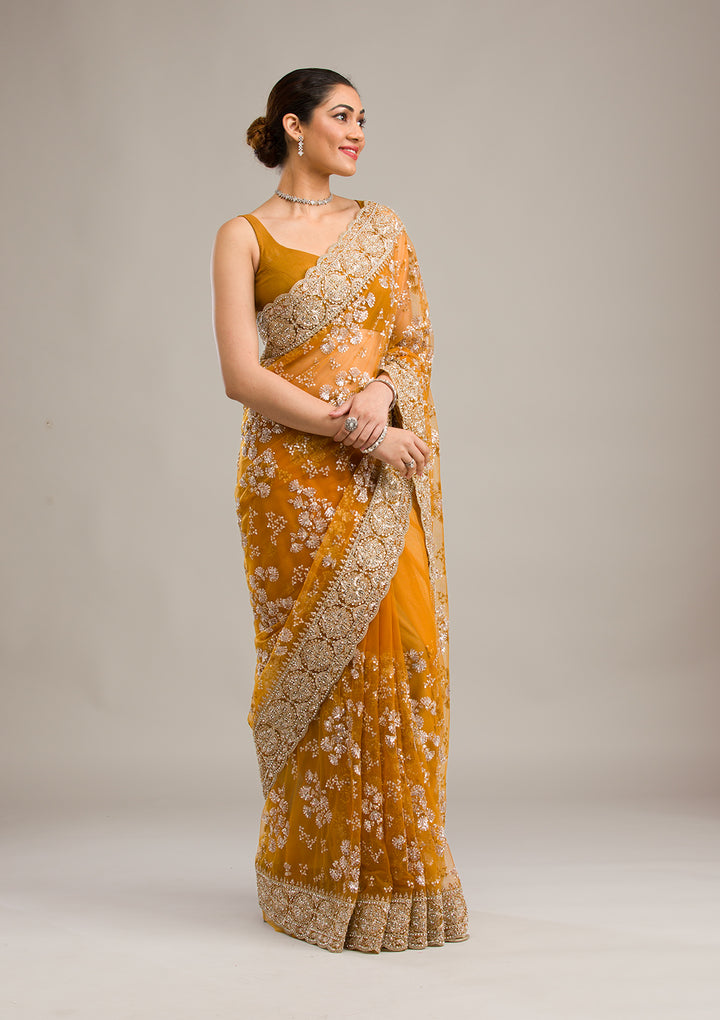 Koskii Net Golden Saree – Embellished with Zariwork