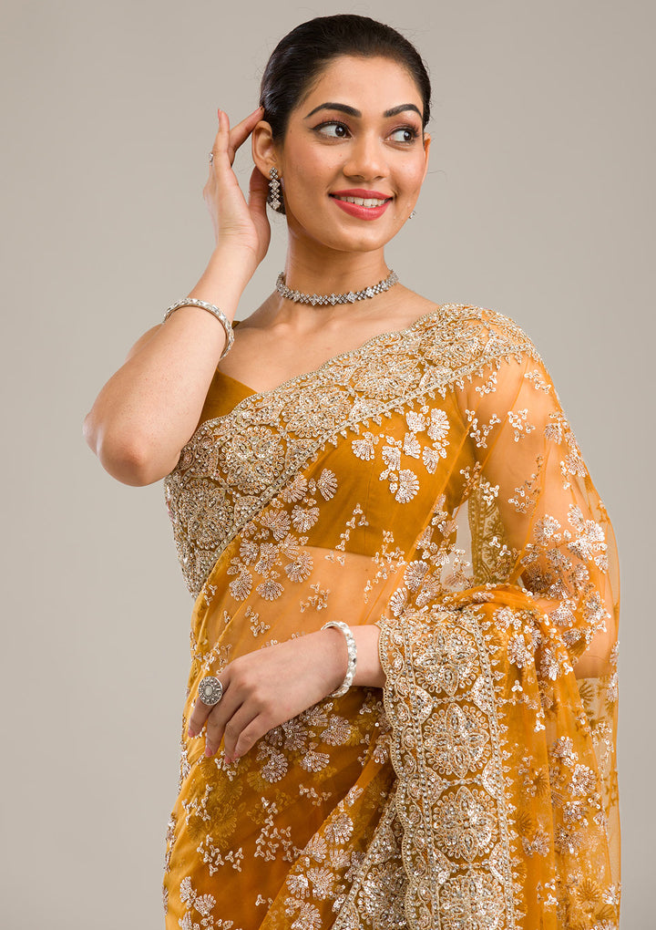 Koskii Net Golden Saree – Embellished with Zariwork