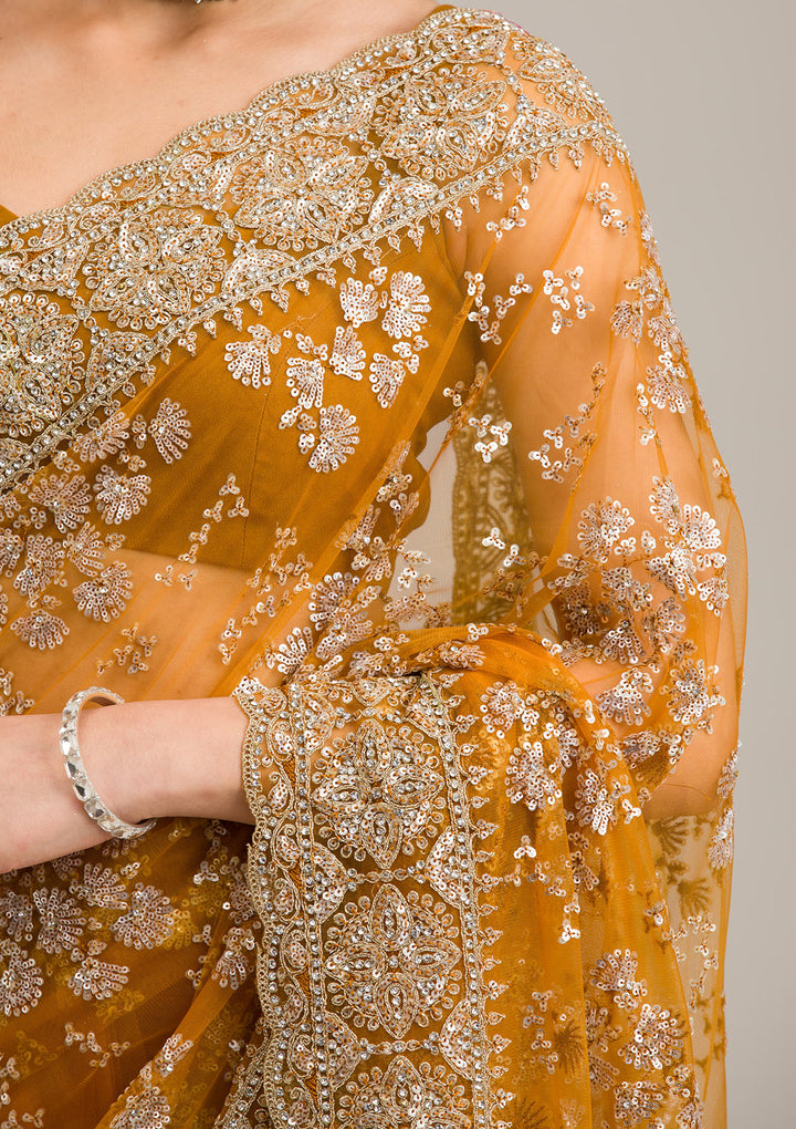 Koskii Net Golden Saree – Embellished with Zariwork