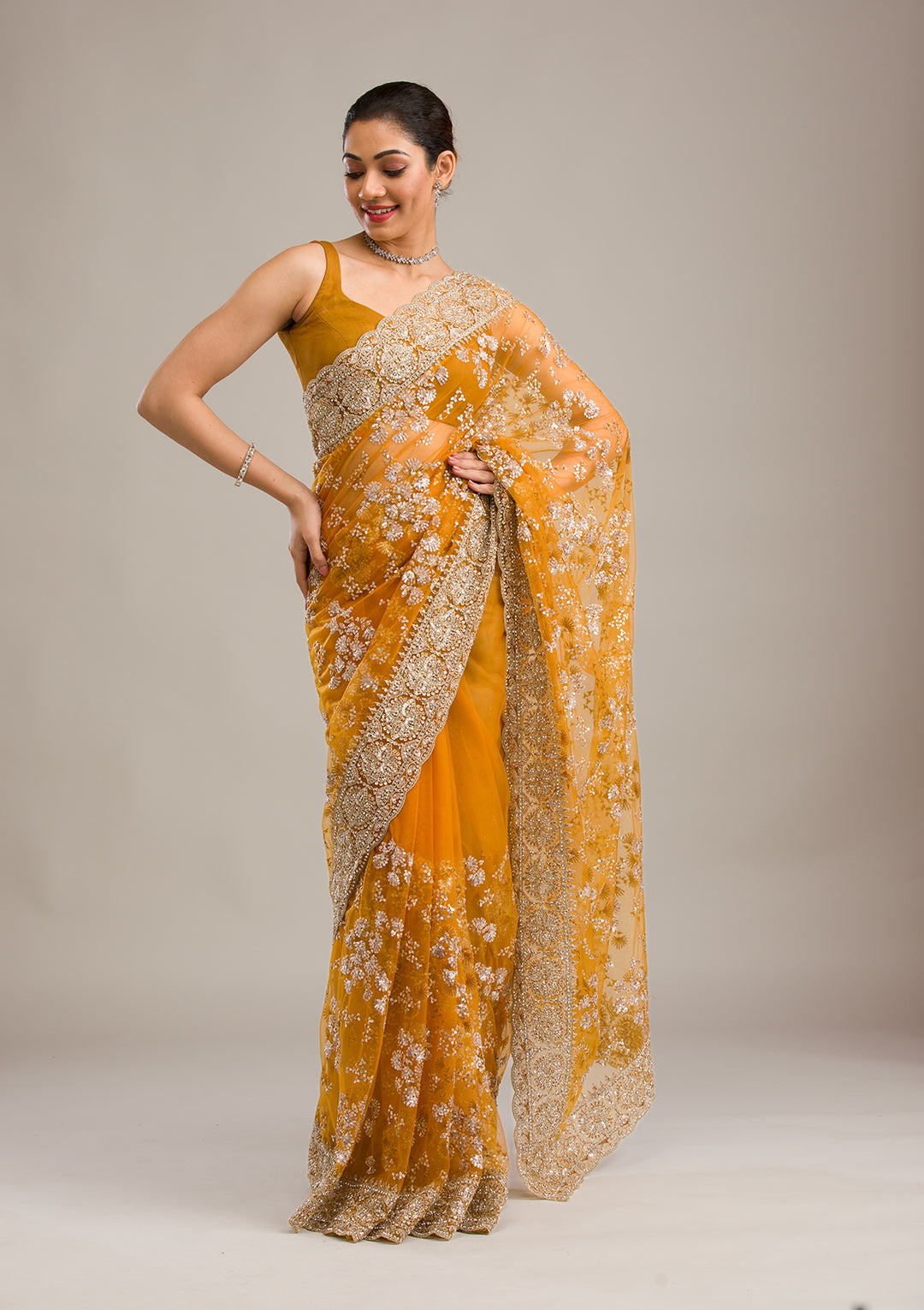 Koskii Net Golden Saree – Embellished with Zariwork