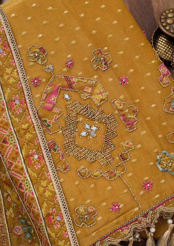 Mustard Yellow Crepe Cutdana Unstitched Dress Material With Matching Bottom And Dupatta
