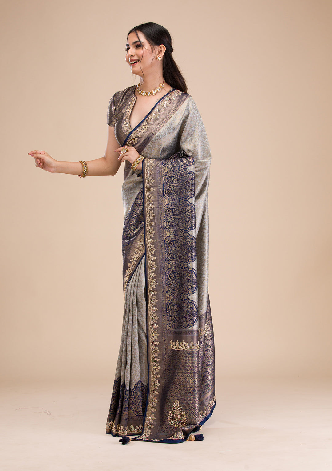 Koskii Orange Saree with Exquisite Threadwork – Traditional Elegance