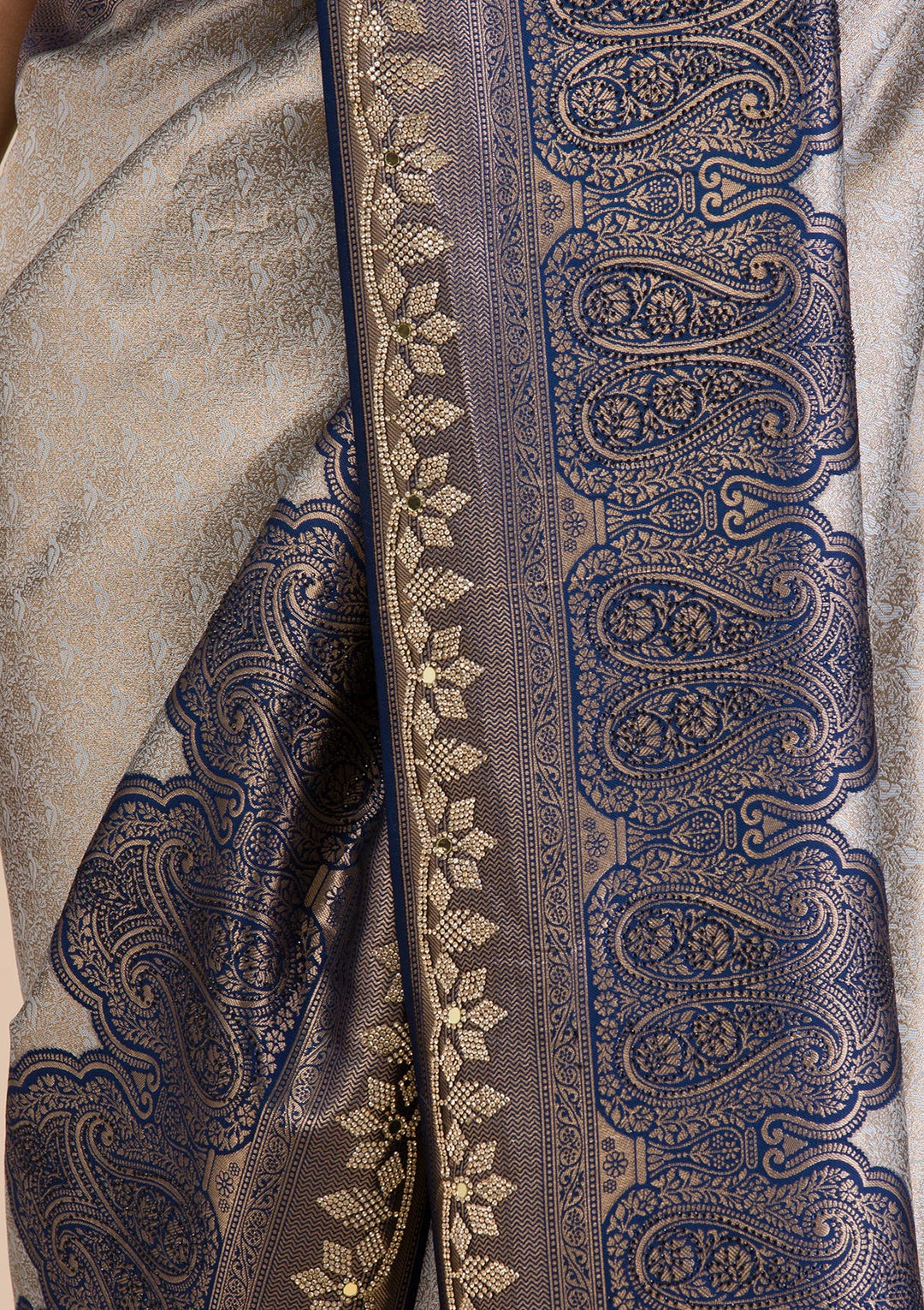 Koskii Orange Saree with Exquisite Threadwork – Traditional Elegance