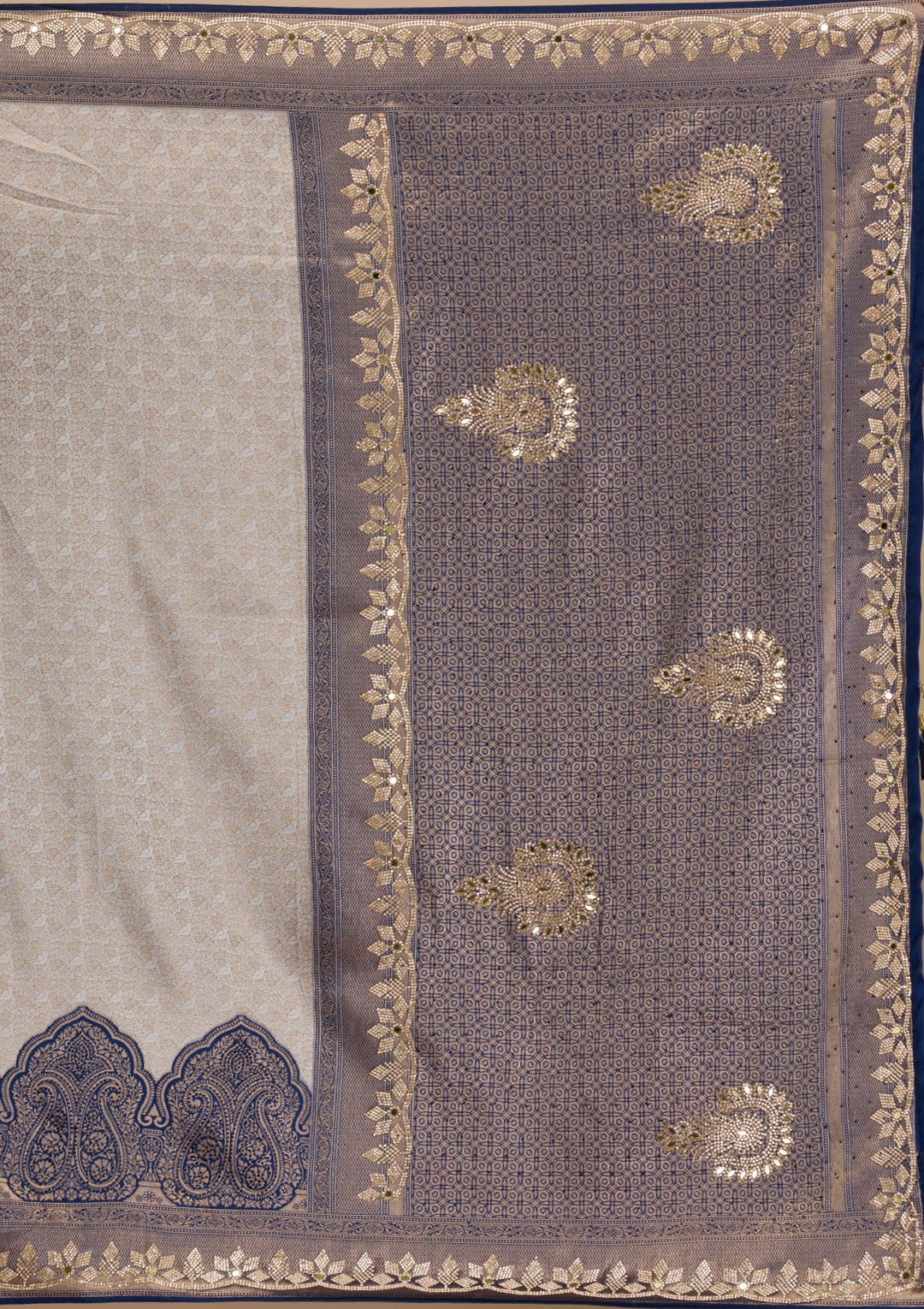Koskii Orange Saree with Exquisite Threadwork – Traditional Elegance