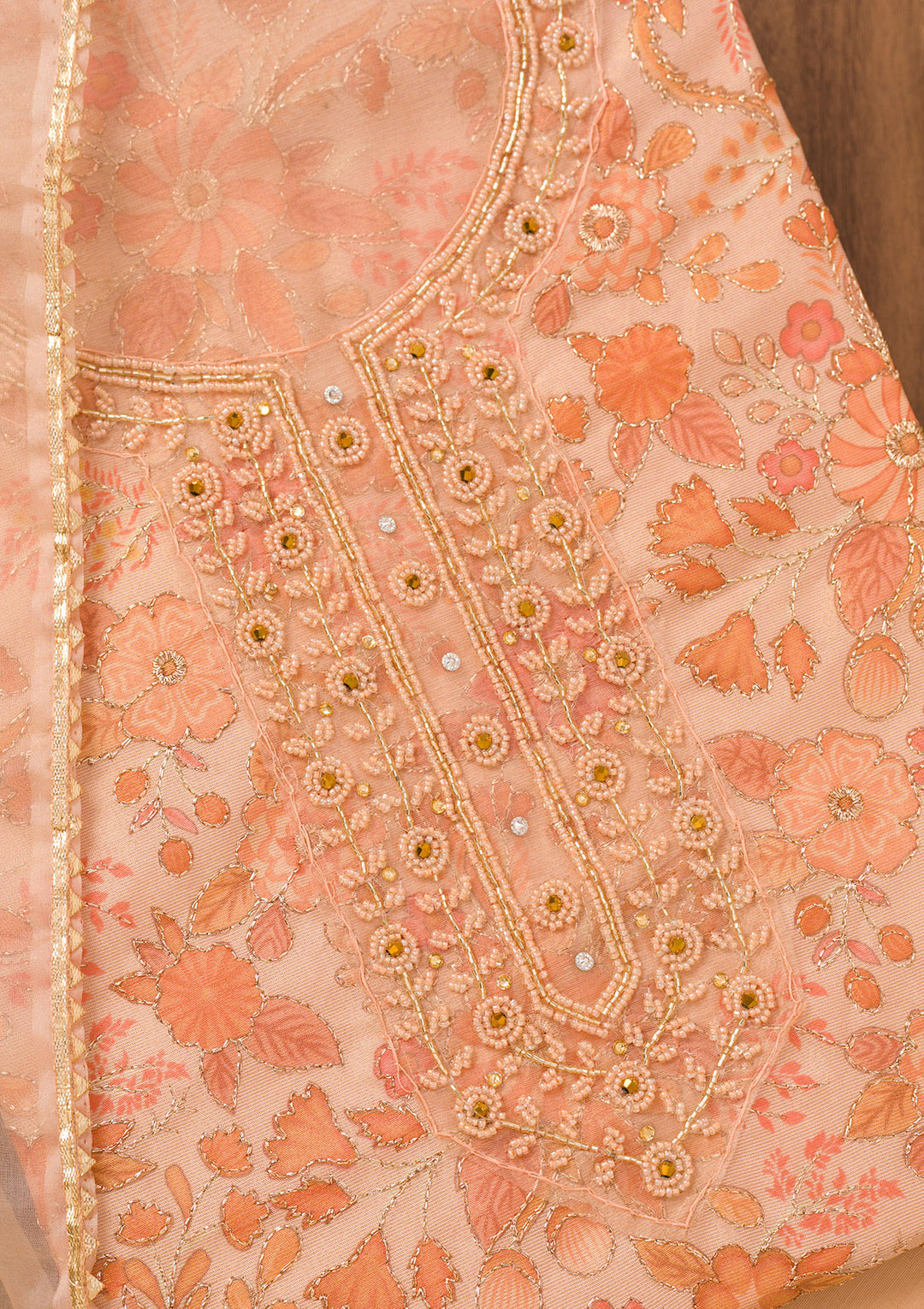 Peach Tissue Floral Cutdana Unstitched Dress Material With Matching Bottom And Dupatta