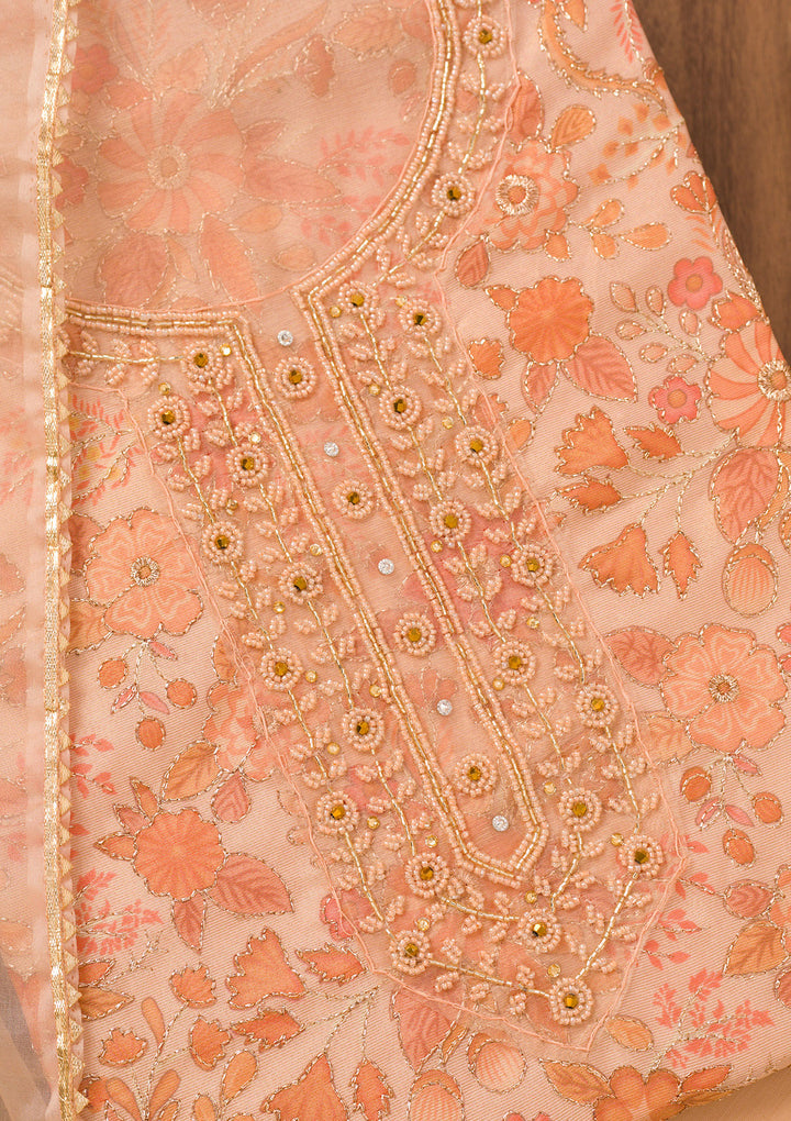 Peach Tissue Floral Cutdana Unstitched Dress Material With Matching Bottom And Dupatta