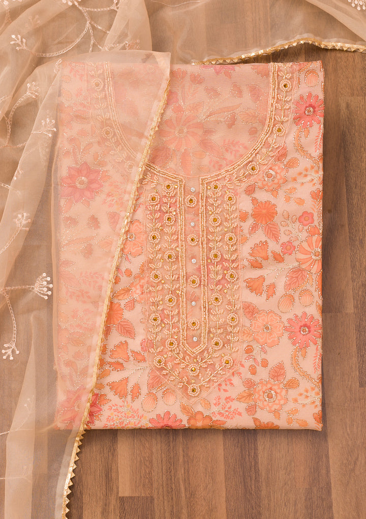 Peach Tissue Floral Cutdana Unstitched Dress Material With Matching Bottom And Dupatta