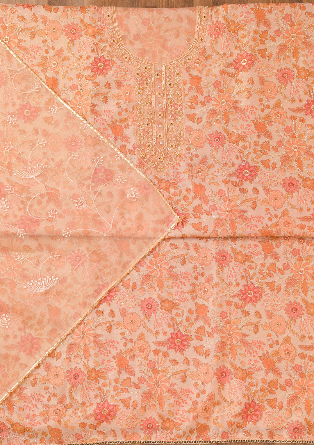 Peach Tissue Floral Cutdana Unstitched Dress Material With Matching Bottom And Dupatta