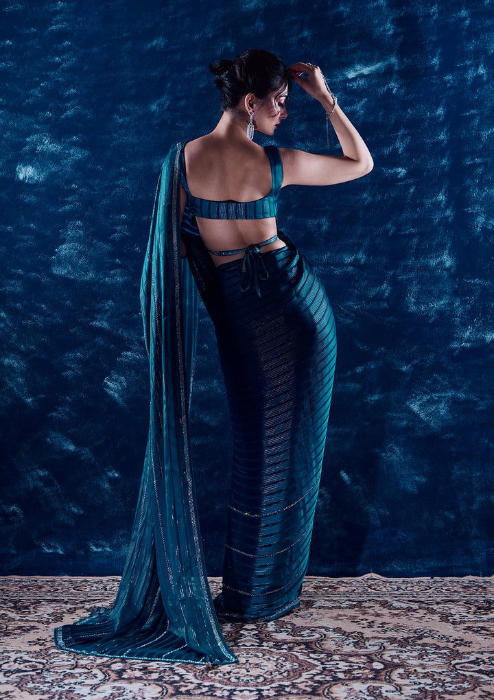 Peacock Blue Semi Crepe Swarovski Saree With Matching Blouse Piece