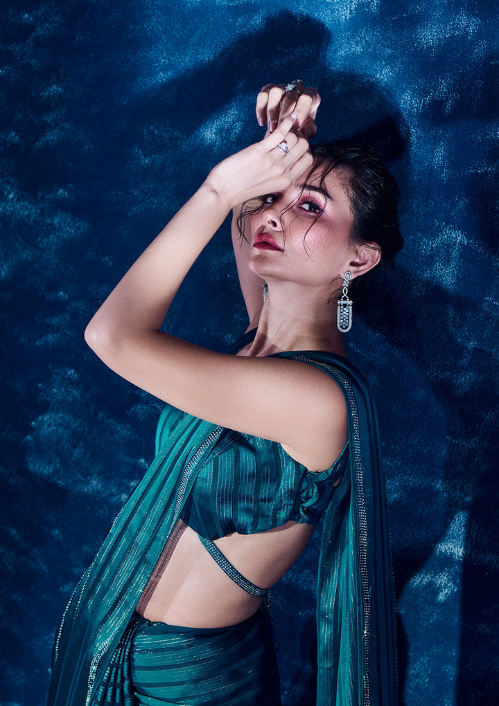 Peacock Blue Semi Crepe Swarovski Saree With Matching Blouse Piece