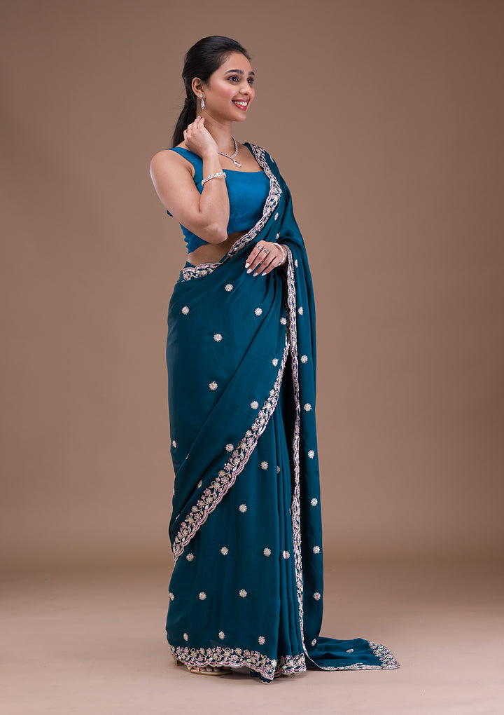 Peacock Blue Crepe Silver Zariwork Saree With Matching Blouse Piece
