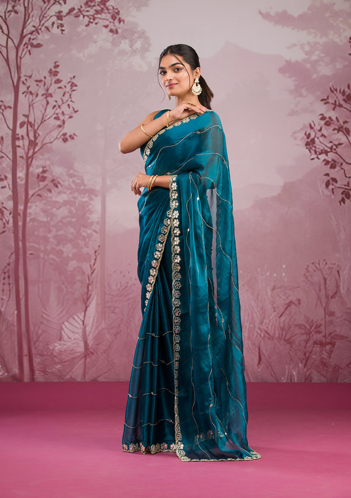 Peacock Blue Organza Mirrorwork Saree With Matching Blouse Piece